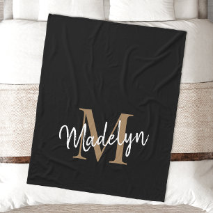 Eleganten Feminine Chic med svart monogram Guld Fleecefilt