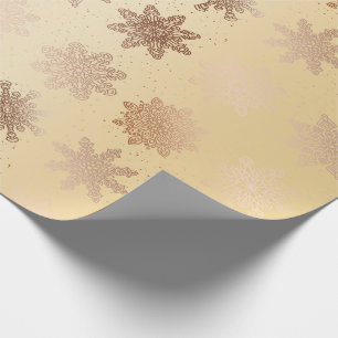 Eleganten förkopprar det guld- Snowflakejulmönst Presentpapper