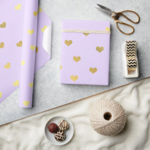 Elegantt guld- purpurfärgat valentin mönster fö presentpapper