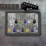 Elektriska gitarrer<br><div class="desc">Många färg av elektriska gitarrer mot bakgrund av metalliskt grått.</div>