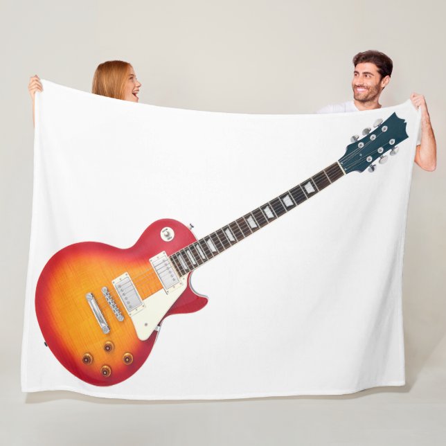 ELEKTRISKA GUITARER AV IKONKISK SUNBURST FLEECEFILT (På plats)