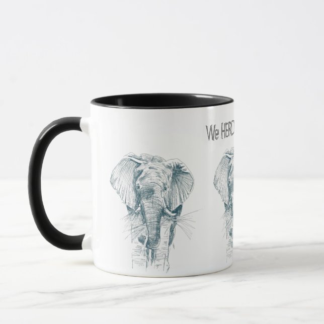 Elephant Herd Bläck teckning och en Funny Satt Mugg (Vänster)