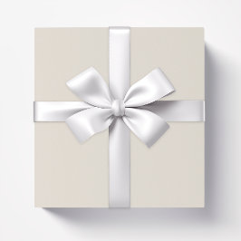 Elfenben av gräddbeige presentpapper