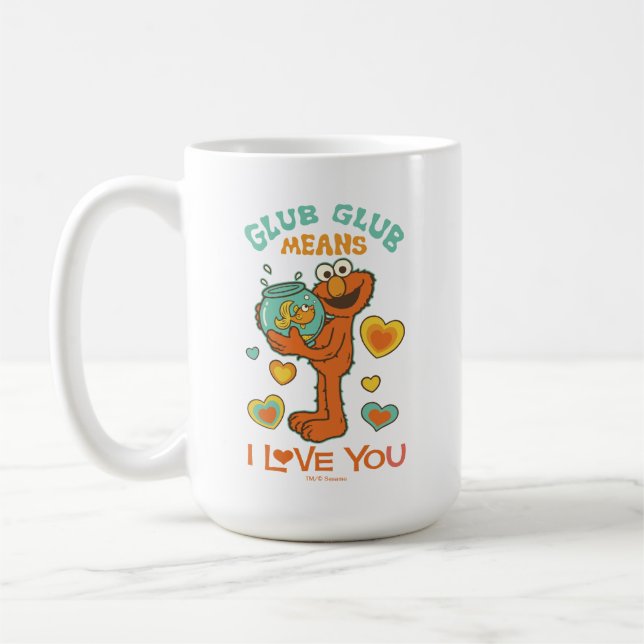 Elmo håller sin guldfisk kaffemugg (Vänster)