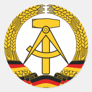 Emblem der DDR - DDR:s nationalemblem. Runt Klistermärke