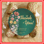 Emerald Green & Gold Wildflower Wedding Thank You Runt Klistermärke<br><div class="desc">Emerald Green & Gold Wildflower Wedding Thank You Classic Round Sticker | Botanical & Luxe Gold Favor Seal Add a touch of natural elegance to your wedding favors and decor with our delightful Emerald Green & Gold Wildflower Wedding Thank You Classic Round Sticker! These beautiful stickers feature intricate wildflower botanical...</div>