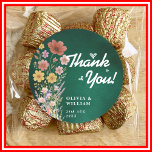 Emerald Green Wildflower Wedding Thank You Runt Klistermärke<br><div class="desc">Emerald Green Wildflower Wedding Thank You Classic Round Sticker | Elegant Gold Luxe Floral Favor Seal Add a beautiful finishing touch to your wedding favors and envelopes with our exquisite Emerald Green Wildflower Wedding Thank You Classic Round Sticker! This charming sticker features lush emerald green botanical wildflowers, elegantly accented with...</div>