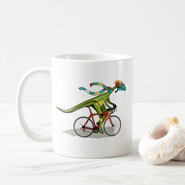 En Anabisetia Dinosaur Riding A Bicycle. Kaffemugg (Med munk)