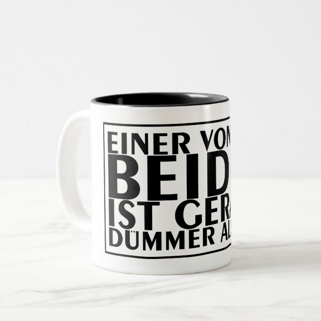 En av oss två är just nu dummare än jag 01 Två-Tonad mugg (Framsida vänster)