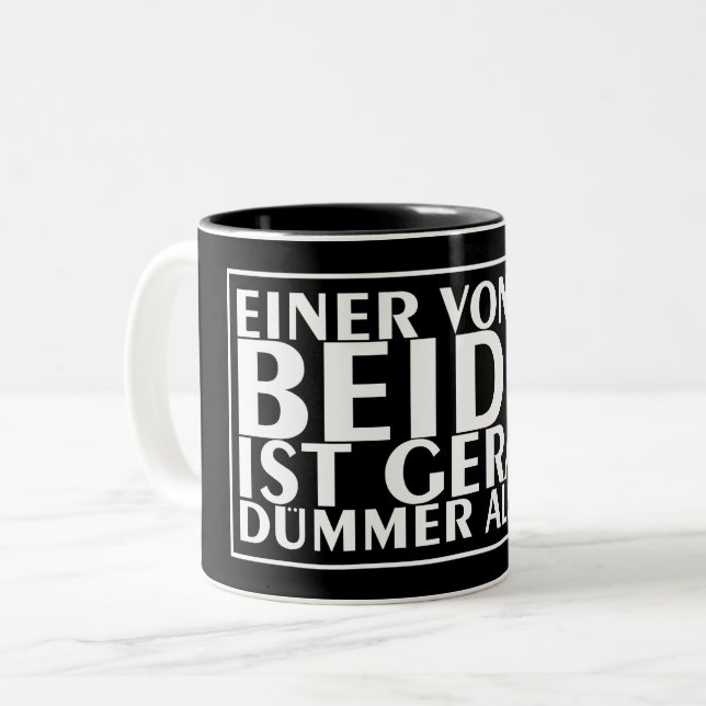 En av oss två är just nu dummare än jag 01 Två-Tonad mugg (Framsida vänster)