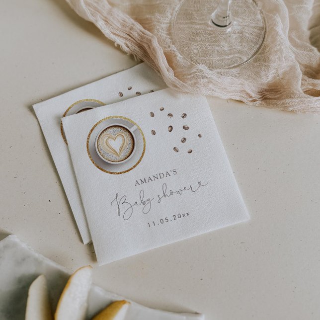 En Baby håller på att blåsa barnskor för kaffe Pappersservett (Skapare uppladdad)