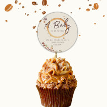 En Baby håller på att blåsa upp kaffebabyskor Tack