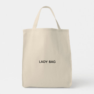 En beige toteväska med texten "LADY BAG" tryckt  Tygkasse