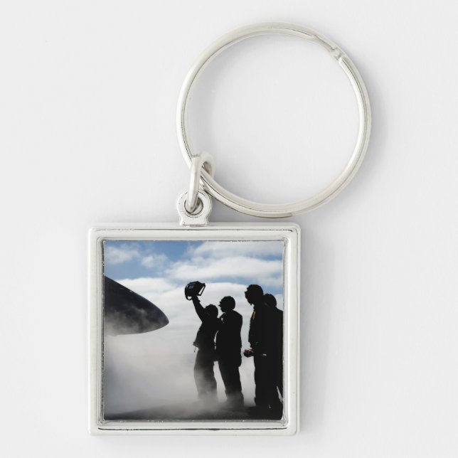 En besättningsmedlem i cockpit fyrkantig silverfärgad nyckelring (Framsidan)