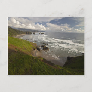 En beskåda av kanonstranden på den Oregon kusten Vykort