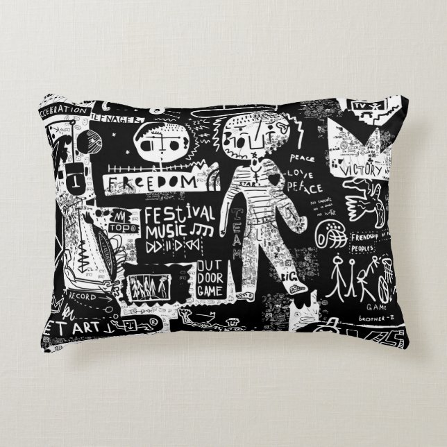 En bild som innehåller flera symboler.stre prydnadskudde (Framsidan)