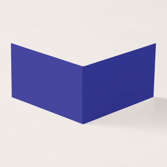 en blå vägg med klocka på den kort (Utsida)