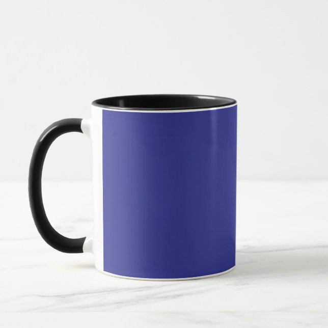 en blå vägg med klocka på den mugg (Vänster)