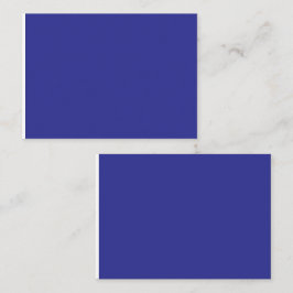 en blå vägg med klocka placeringskort