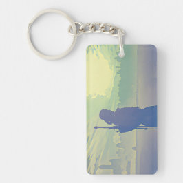 En blå Witcher-nyckelkedja