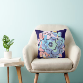 En blomma av färgfläckar kudde