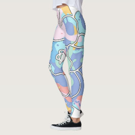 En blomma gjord av färgfläckar leggings