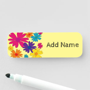 En blommigt av daisy blommor namnbricka