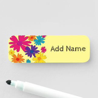 En blommigt av daisy blommor namnbricka
