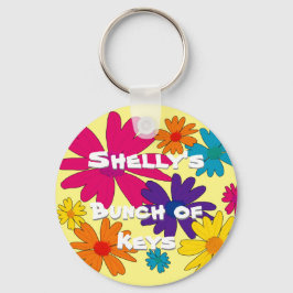 En blommigt av daisy blommor nyckelring