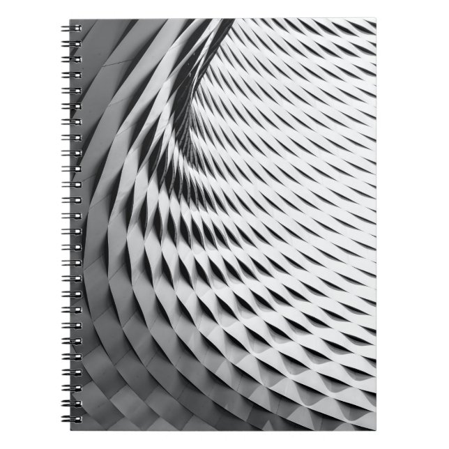 En böjd fasad täckt av vit lattikram anteckningsbok (Framsidan)