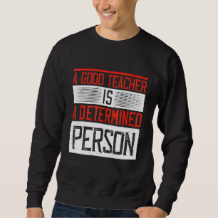 En Bra Lärare är en beslutsam person Lång Ärmad Tröja
