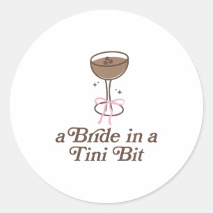 En bricka i en Tini-bit Svan Bow Coquette Bachelor Runt Klistermärke
