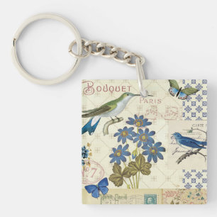 En bukett av blåa blommor, fåglar och fjärilar