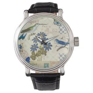En bukett av blåa blommor, fåglar och fjärilar armbandsur