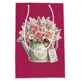 En bukett blommor i en vattenkanna till mamma