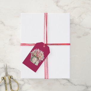 En bukett blommor i en vattenkanna till mamma presentetikett