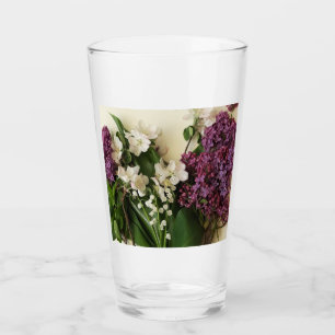 En bunch av Vår blommor Glaskopp