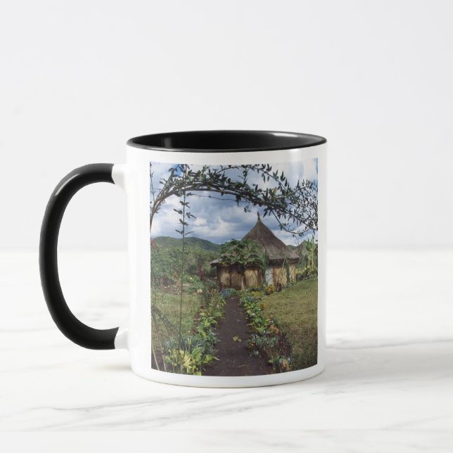 En by i högländerna, Goroka, Papua Nya Guinea Mugg (Vänster)