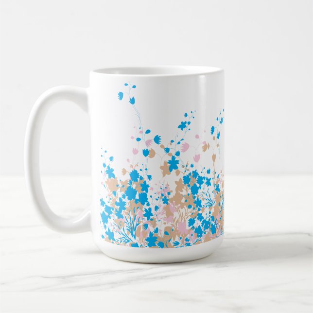 En charmerande arrangemang av blått och rosa blomm kaffemugg (Vänster)
