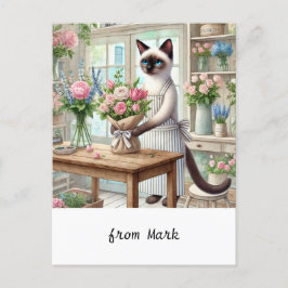 En charmig katt arrangerar omsorgsfullt vacker blo helg vykort