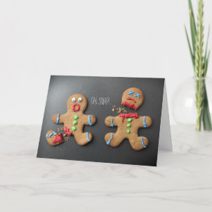 En chockad pepparkaksgubbe med brutet ben helgkort