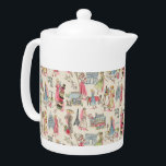 En dag i Paris<br><div class="desc">Medium white Porcelain-tekanna med en bild av hatat dam som njuter av en underbar dag i Paris fullt av shopping, matning och syn. Se matchande godisskål, espresso kopp, kolv, mugg, pitcher, papper plåt och underlägg. Se hela uppsättningen av Cancan-Tekannan i LIVSMEDEL/BEV | Avsnittet Dagar. Den här produkten är inte associerad...</div>