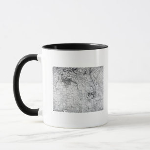 En dela upp av ett lakan från granskningen mugg