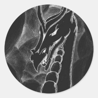 En drake i rök (svart) runt klistermärke