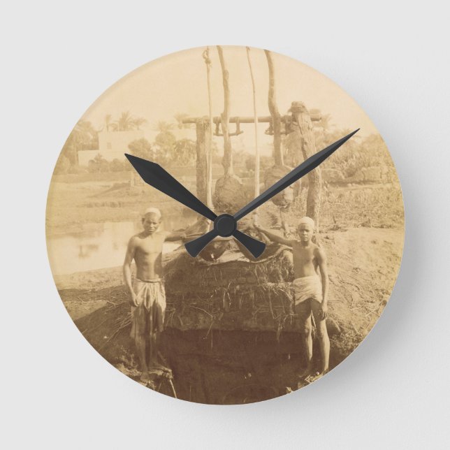 En egyptisk bevattningmaskin på banker av rund klocka (Framsida)