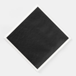 En enfärgad mörkt svart texturerad bakgrund fyller pappersservett