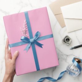 En enhetlig mjuk rosa bakgrund presentpapper