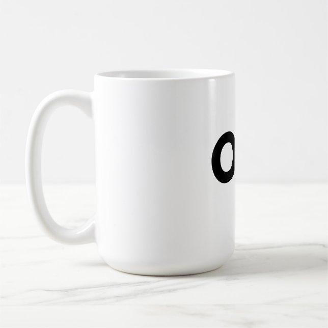 EN enkel typografi-mugg  Kaffemugg (Vänster)