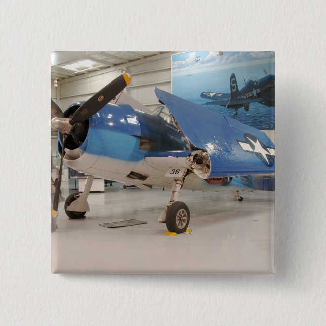 En F-6F Hellcat från andra världskriget på Knapp (Framsida)