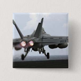 En F/A-18E-Toppen-häftning Knapp